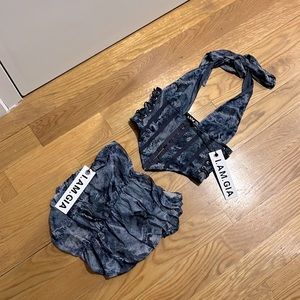 I am Gia set size xs  Top& skirt